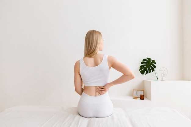 Как уменьшить боль в спине при месячных